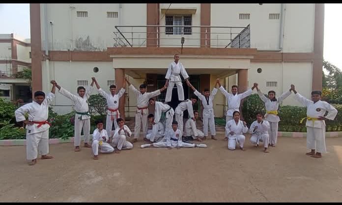 Students forming a pyramid formation